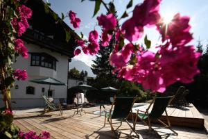 Vonkajšia záhrada v ubytovaní House of Hütter - Wachtelhof & SPA