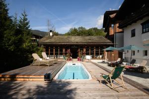 Bazén v ubytovaní House of Hütter - Wachtelhof & SPA alebo v jeho blízkosti