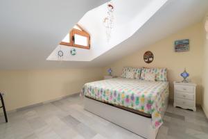 A bed or beds in a room at Doña Pia Mijas