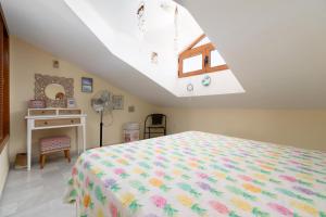 A bed or beds in a room at Doña Pia Mijas