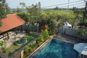 an overhead view of a swimming pool in front of a house at Aki Eco-villa Hội An in An Bang