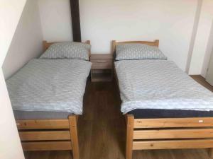 Voodi või voodid majutusasutuse Sleep & Go Korycany toas