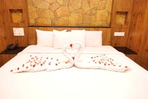Postel nebo postele na pokoji v ubytování Sakthi Hotel + 51 fotografií