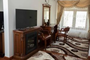TV a/nebo společenská místnost v ubytování Complex Trans Bitum + 25 fotografií