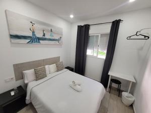 Postel nebo postele na pokoji v ubytování AYZ Silvela - Auto check-in property