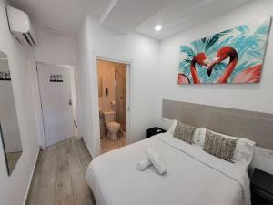 Postel nebo postele na pokoji v ubytování AYZ Silvela - Auto check-in property