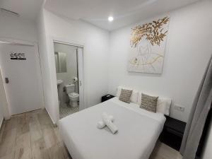 Koupelna v ubytování AYZ Silvela - Auto check-in property
