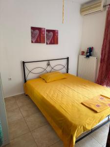 Postel nebo postele na pokoji v ubytování Toroni House!