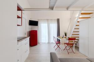 TV a/nebo společenská místnost v ubytování Conca d'oro B&B and Apartments