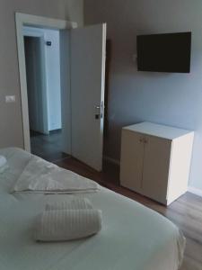 Postel nebo postele na pokoji v ubytování Hotel Sole