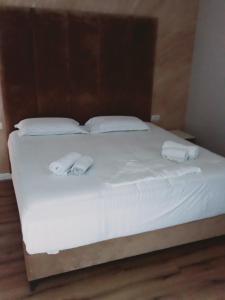 Postel nebo postele na pokoji v ubytování Hotel Sole