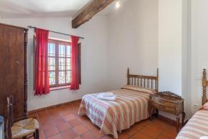 Postel nebo postele na pokoji v ubytování La Bodega de Gredos