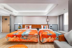 Dingshe Hotel Guangzhou Shamian Island Yongqingfang Branchにあるベッド