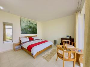 Postel nebo postele na pokoji v ubytování Shree Parijat Resort - Luxury Resort in Mukteshwar