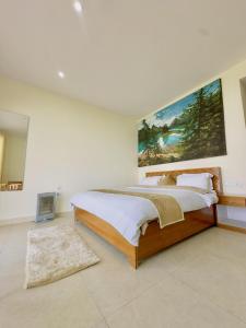 Postel nebo postele na pokoji v ubytování Shree Parijat Resort - Luxury Resort in Mukteshwar