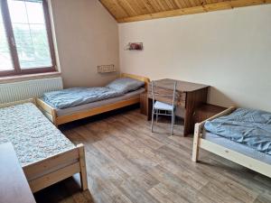 Postel nebo postele na pokoji v ubytování Apartmány ŠTĚSTÍ + 12 fotografií