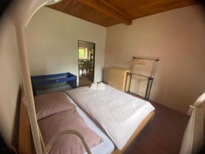 Postel nebo postele na pokoji v ubytování Apartmány Dolní Vítkov