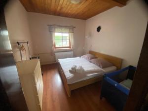 Postel nebo postele na pokoji v ubytování Apartmány Dolní Vítkov