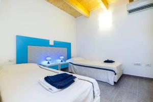 A bed or beds in a room at Residenza Cuntin