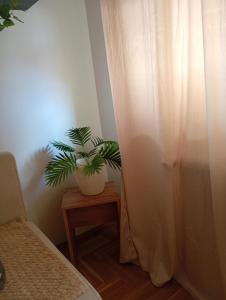 Postel nebo postele na pokoji v ubytování Apartman Sunce