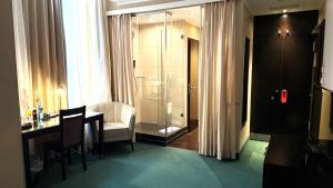 Koupelna v ubytování Hotel Lumière an der Messe + 37 fotografií