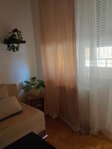 Postel nebo postele na pokoji v ubytování Apartman Sunce