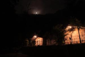 a house at night with lights on it at Moonlight Luxury Camps in Shivpuri