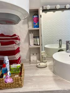 a bathroom with a sink and a mirror at Farmhouse Dženi in Vlasic +67 photos