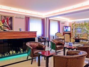 TV a/nebo společenská místnost v ubytování Hotel Jardim