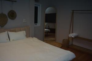 Postel nebo postele na pokoji v ubytování Mơ Màng Homestay + 8 fotografií