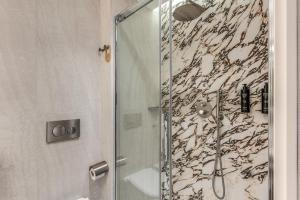 Koupelna v ubytování Hotel Fori Imperiali
