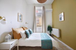 Ένα ή περισσότερα κρεβάτια σε δωμάτιο στο Jewish Quarter Studio for Two with AC