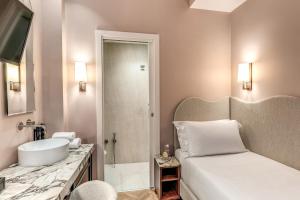 Koupelna v ubytování Hotel Fori Imperiali