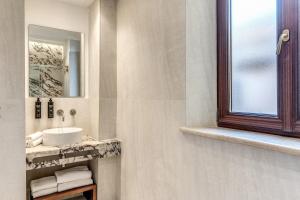 Koupelna v ubytování Hotel Fori Imperiali