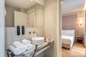 Koupelna v ubytování Hotel Fori Imperiali