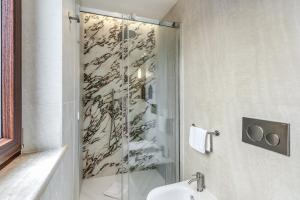Koupelna v ubytování Hotel Fori Imperiali
