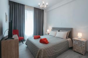 Letto o letti in una camera di Athens Point