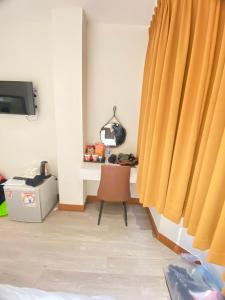 TV a/nebo společenská místnost v ubytování Lookits Hostel
