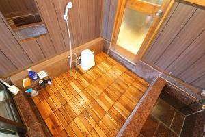 an overhead view of a bathroom with a toilet at Y'sINN 宮城野 040H in Hakone