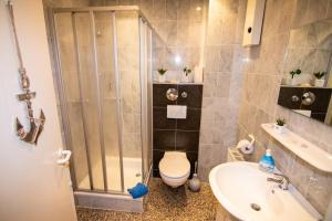 Ένα μπάνιο στο Ferienwohnung in Dorum