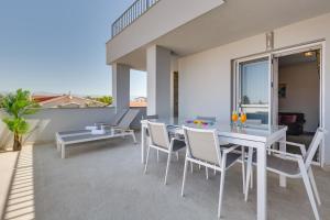 Balkón alebo terasa v ubytovaní Apartmani Kaštelina + 37 fotografií