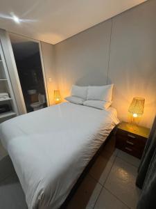 Ένα ή περισσότερα κρεβάτια σε δωμάτιο στο Accommodation Front - Sea View 2 Sleeper