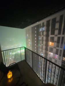 a room with a balcony with a view of a city at Студія-трансформер ЖК Лісопарковий in Vinnytsya +11 photos