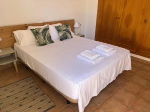 Postel nebo postele na pokoji v ubytování Villa Aries