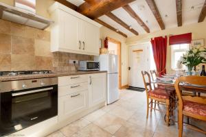 Dapur atau dapur kecil di Foldyard 2 bedrooms