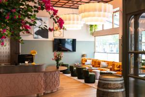 TV a/nebo společenská místnost v ubytování Hotel Fratelli