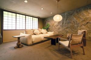 Uma área de estar em 赤城宿 珠蕾山荘-shurai-