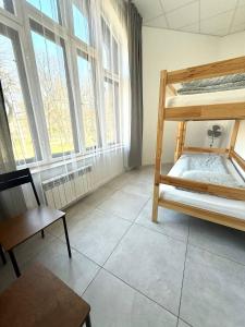 Postel nebo postele na pokoji v ubytování Golden Hostel