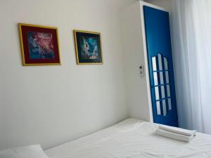 Postel nebo postele na pokoji v ubytování PKM Apartments Baska Voda