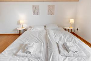 Voodi või voodid majutusasutuse Villa architecte lumineuse avec jardin privé toas